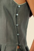 Sleeveless tunic dress in linen with contrasting color trims